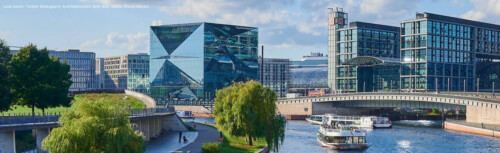 Quelle: cube berlin: Torben Østergaard, Architekturbüro 3XN; Bild: Adobe Stock/campix. Blick auf den Cube in Berlin mit Schiff auf dem Fluss davor